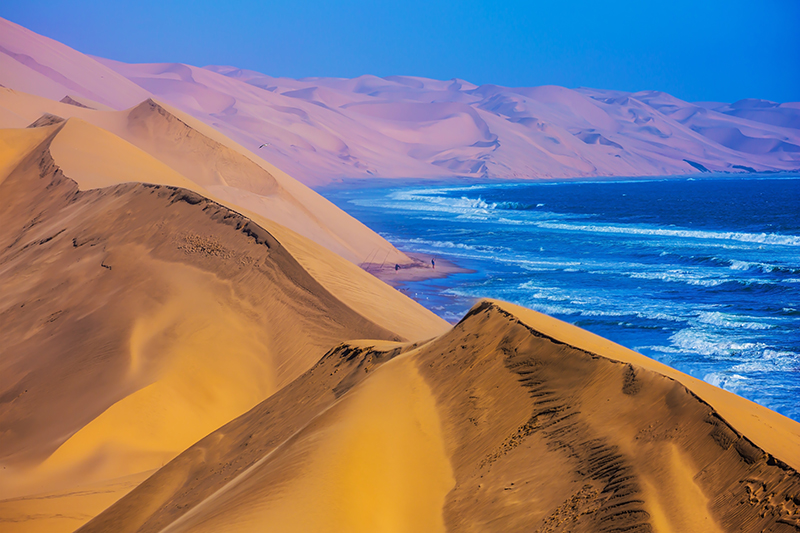 The Atlantic Ocean, moving sand dunes, Namibia